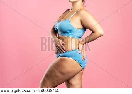 Fat Woman In Blue Underwear On Pink Background, Overweight Female Body