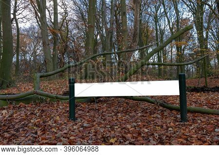 Blank Sign Board In A Park In Autumn Seasan Fall Leaves