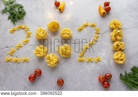 From Pasta, The Figures 2021 Are Laid Out From Shells, Bows, As Well As Yellow Peppers, Small Red To