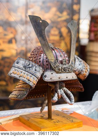 Parma, Italy - September 2020: Antique Medieval Asian Helmet Kabuto: Japanese Theme.