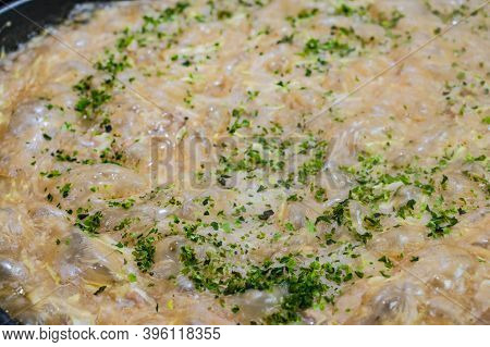 Close Up Monjayaki In Japanese Restaurant.monjayaki Is A Type Of Japanese Pan-fried Batter, Popular 