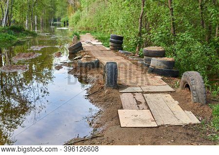 Impromptu Pavement On The Embankment Was Made In The Countryside During A Spring River Flood
