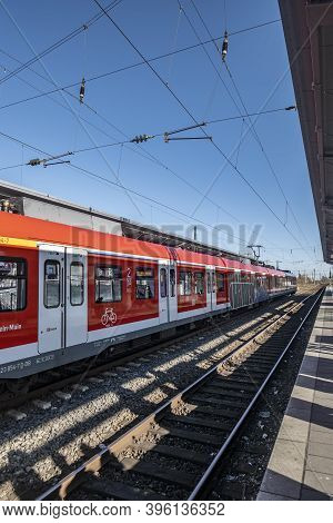 Frankfurt, Germany - February 5, 2020: People Wait At The Train Station Frankfurt-hoechst For The Tr