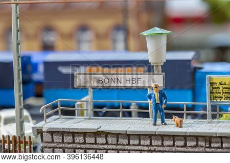Frankfurt, Germany - February 19, 2020: Plastic Man With Dog Waits At The Train Station In Bonn For 