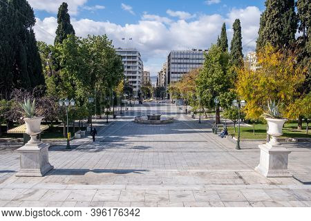 Athens, Greece. People Wearing Covid 19 Protective Face Masks Walking On Syntagma Square