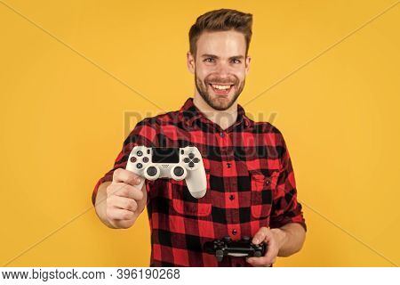 Try This One. Man Playing Video Game With Controller. Bearded Man Using Virtual Reality Gamepad. New