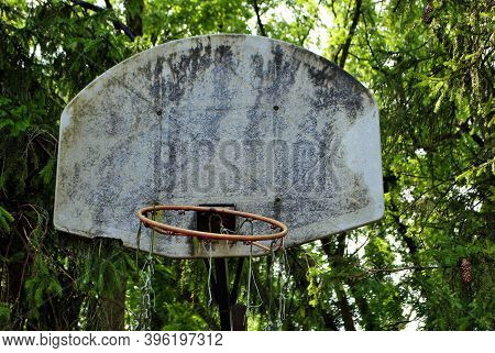 Very Old Abandoned Basketball Hoop That Is Falling Apart
