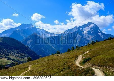 Hiking Near Ski Station Les Deux Alpes And View On Alpine Mountains Peaks In Summer, Isere, France