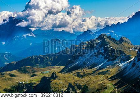 The Dolomites. Alpine road of South Tyrol. Italy - Austria. The Pordoi Pass is part of the Dolomiti Superski ski resort.  