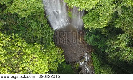 Aerial View Of Forest And River Towards Labuhan Kebo Waterfall Located In Munduk, Bali
