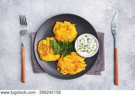 Fried Cakes Of Grated Potatoes On The Plate With Sauce. Traditional Pancakes Boxty Raggmunk.