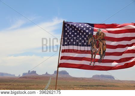 Oljato-monument Valley, Arizona, Usa - July 06, 2017: Flag Of Indigenous Navajo Indians Against The 