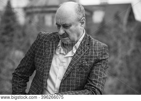 Senior Man In Grief And Sorrow. The Concept Of A Depressed Older Man, The Non-acceptance Of Oneself 
