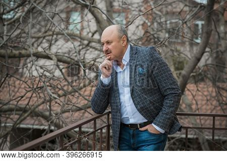 Senior Man In Grief And Sorrow. The Concept Of A Depressed Older Man, The Non-acceptance Of Oneself 