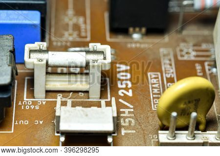 Atina,frosinone,lazio,italy-october 30,2020:fuse And Electrical Components On Tv Circuit Board,macro