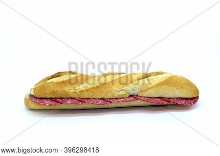 Salami Sandwich Om Baguette, Typical Italian Spiced Sausage On Spanish Pitufo Bread Mollete