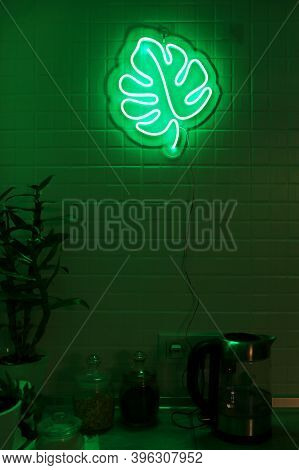 Neon Sign Monstera In The Decor Of The Kitchen. Trendy Style. Neon Sign. Custom Neon. Home Decor.