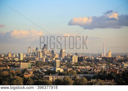 View Towards London City Skyline At Sunset From Parliament Hill In Hampstead Heath