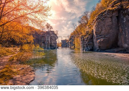 View To A Mountain River In Early Spring. Rocky Riverbanks