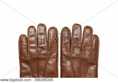Brown Classic Leather Mens Gloves On White Isolated Background Top View. Stylish Fashionable Winter 