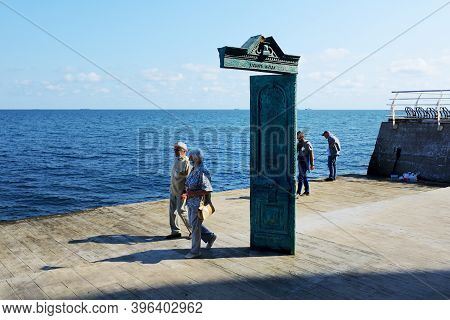 Odesa, Ukraine - September 25: The Couple Of Senior People With Medical Masks Are Near The House Of 