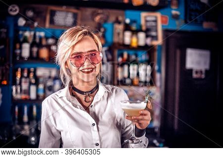 Girl Bartender Creates A Cocktail In The Public House