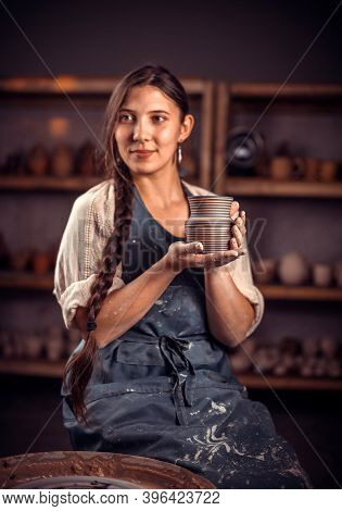 Stylish Professional Potter Working With Pottery At The Ceramic Workshop. Making Pottery.