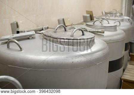 A Can Of Liquid Nitrogen Containing Straws For Fertilizing Cows.