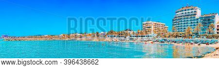 View Of The Beach And The Sea Shore Of A Small Resort Town Sitge