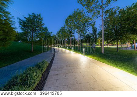 Maple Alley In French Garden In Public Landscape City Park Krasnodar Or Galitsky Park . Wooden Circu