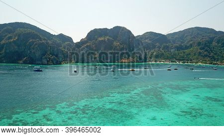 Turquoise Clear Water. Yachts, Boats Floating. Water Gradient From Light To Dark Blue. Phi Phi Don I