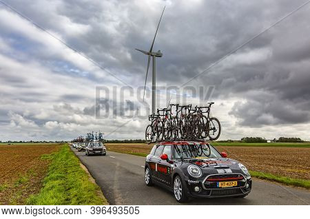Le Gault-saint-denis, France - October 08, 2017: Row Of Technical Vehicles Driving On A Road In The 