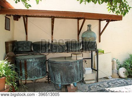 Old Metal Pots And Tanks In The Yard Of Hafiz Ahmed Aga Library.   Rhodes, Greece