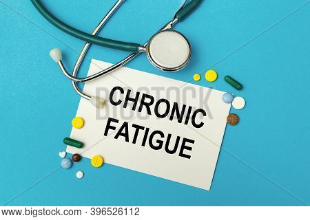 Card With Text Chronic Fatigue, Pills And Stethoscope. Medical Concept.