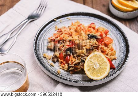Arroz Con Verduras Y Azafran, Spanish Dish. Vegetarian Risotto With  Vegetables, Champignons And Saf