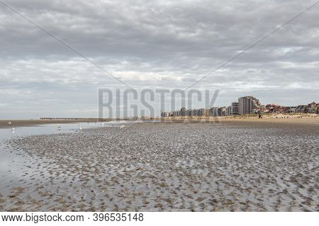 Oostduinkerke, Belgium - November 9, 2020: The Skyline Of Nieuwpoort, Photographed From The Beach