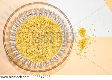 Panicum Is Poured In A Glass Cup. Cereals For Porridge. The View From The Top.
