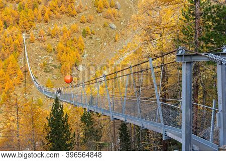 Randa, Switzerland - October 27, 2019: The Charles Kuonen Suspension Bridge In Mettertal, Valais, Sw