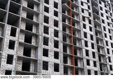 Background - A Wall Of A Multi-storey Building Under Construction