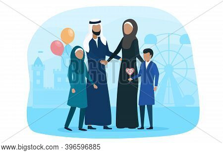 Muslim Family Walking With Kid In Amusement Park. Concept Of Happyi Slamic Family Spending Time Toge