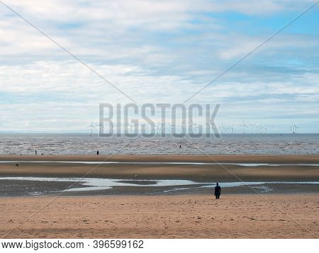 The Beach At Blundell Flats In Sefton, Southport With Pools On The Beach The Beach And The Wind Turb