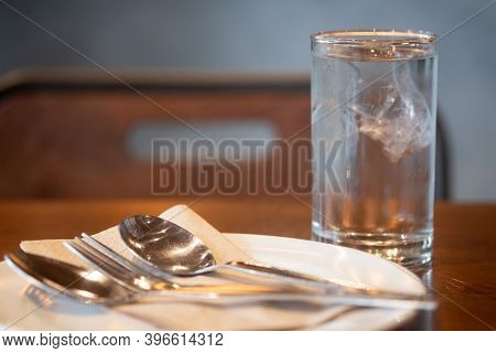 Cold Drink With Ice Cubes On Bar Or Restaurant. Selective Focus