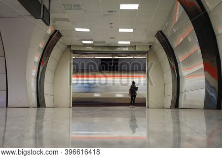 Motin Blured Metro Moving In A Station