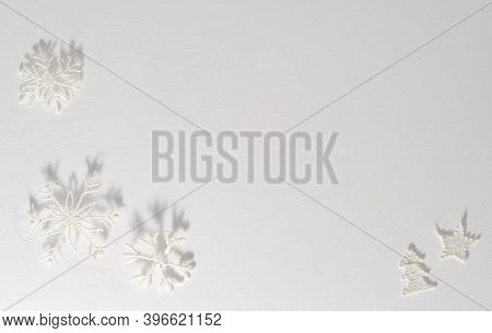 White Background With Snowflakes In The Corners, Empty Space In The Center For Text. Congratulations