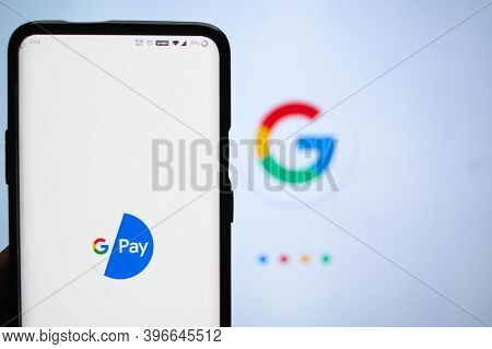 Google Pay App Logged In On A Mobile Infront Of A White Screen With Google Symbol