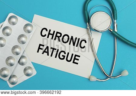 Card With Text Chronic Fatigue, Pills And Stethoscope. Medical Concept.