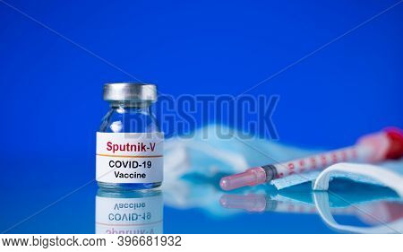 Maski, India - Nov 25,2020 : Sputnik V Vaccine And Syringe To Protect Against Coronavirus Covid-19 D