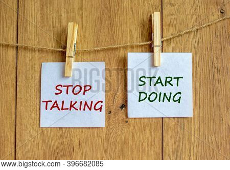 Time To Start Doing. Wooden Clothespins With White Sheets Of Paper. Text 'stop Talking Start Doing'.