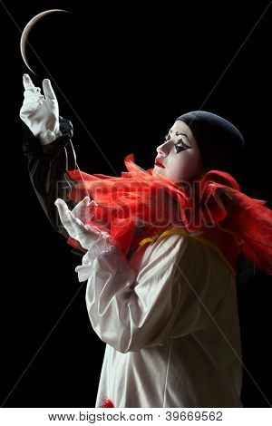 Gyönyörű Pierrot bohóc mime-a hold játék