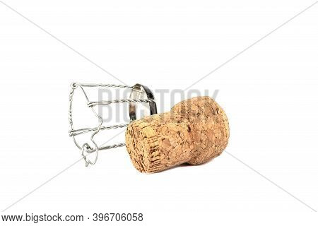 Champagne Cork And Muselet Separately On A White Background. Close Up. Copy Space.